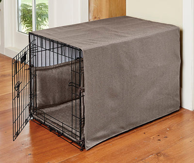Should You Cover A Dog Crate During The Day?